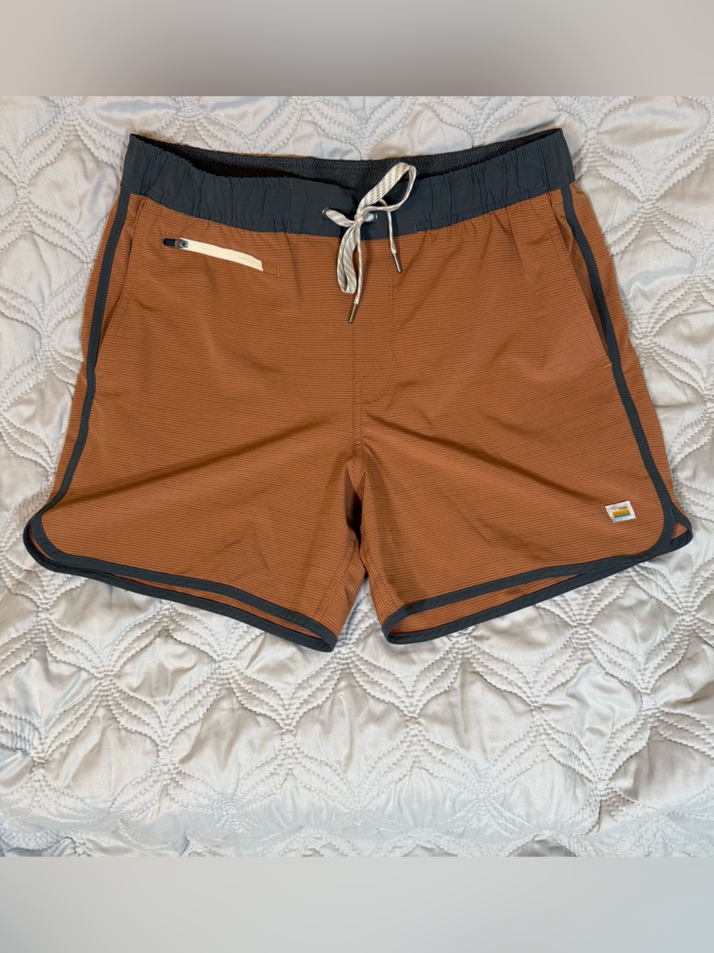Vuori Men's Athletic Shorts in Rust with Black Trim